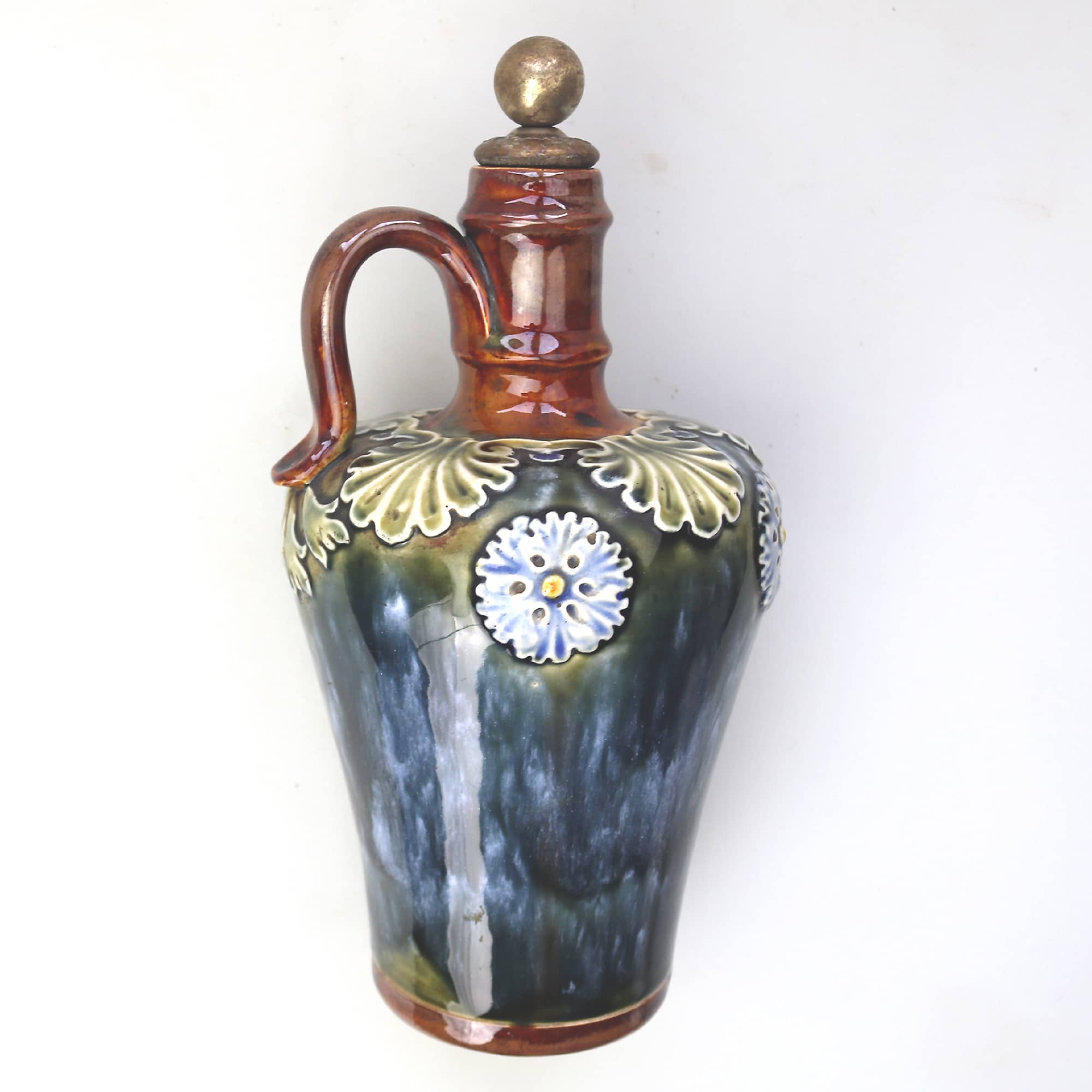 An antique Art Nouveau Royal Doulton pottery Dewars Whiskey Flask C.19thC