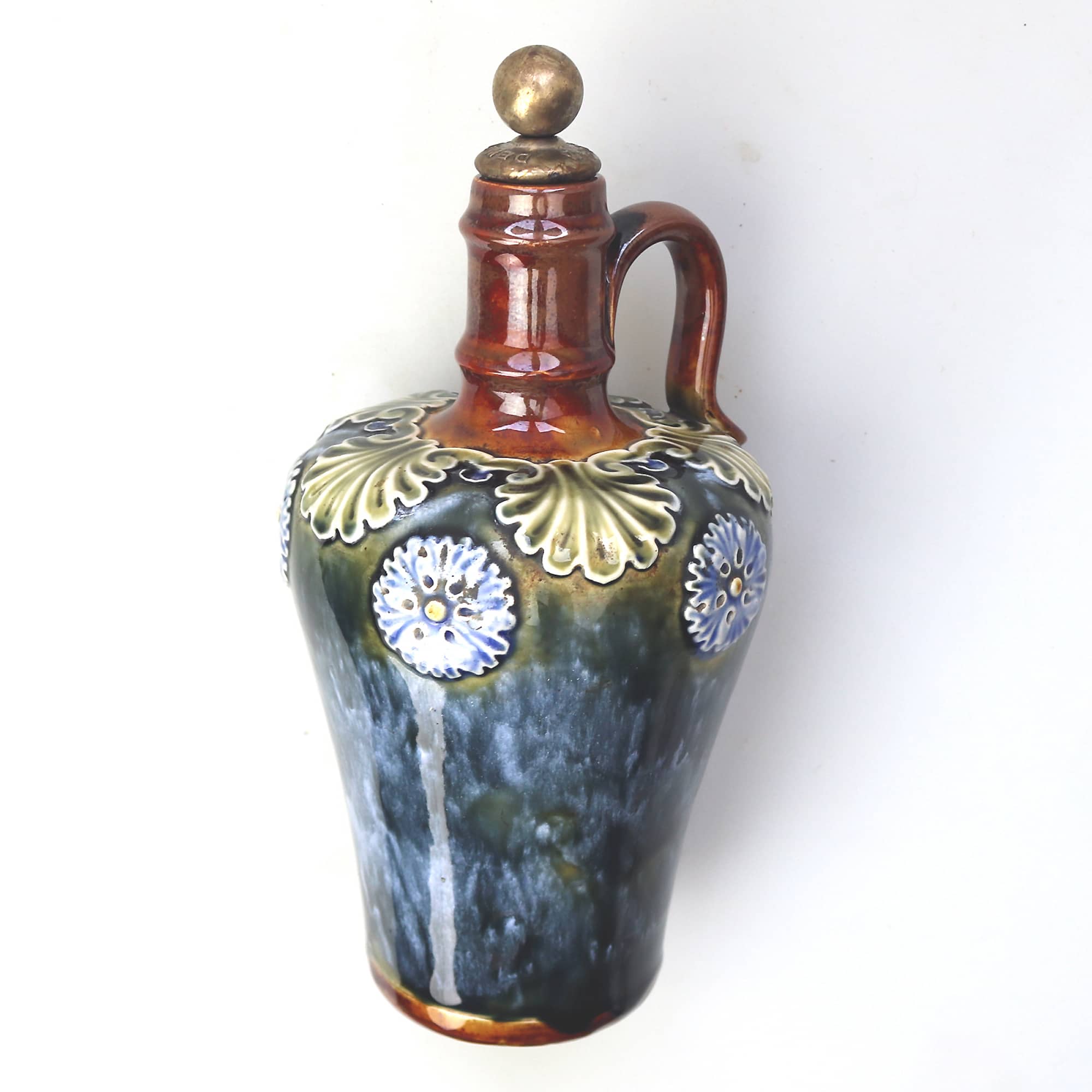 An antique Art Nouveau Royal Doulton pottery Dewars Whiskey Flask C.19thC