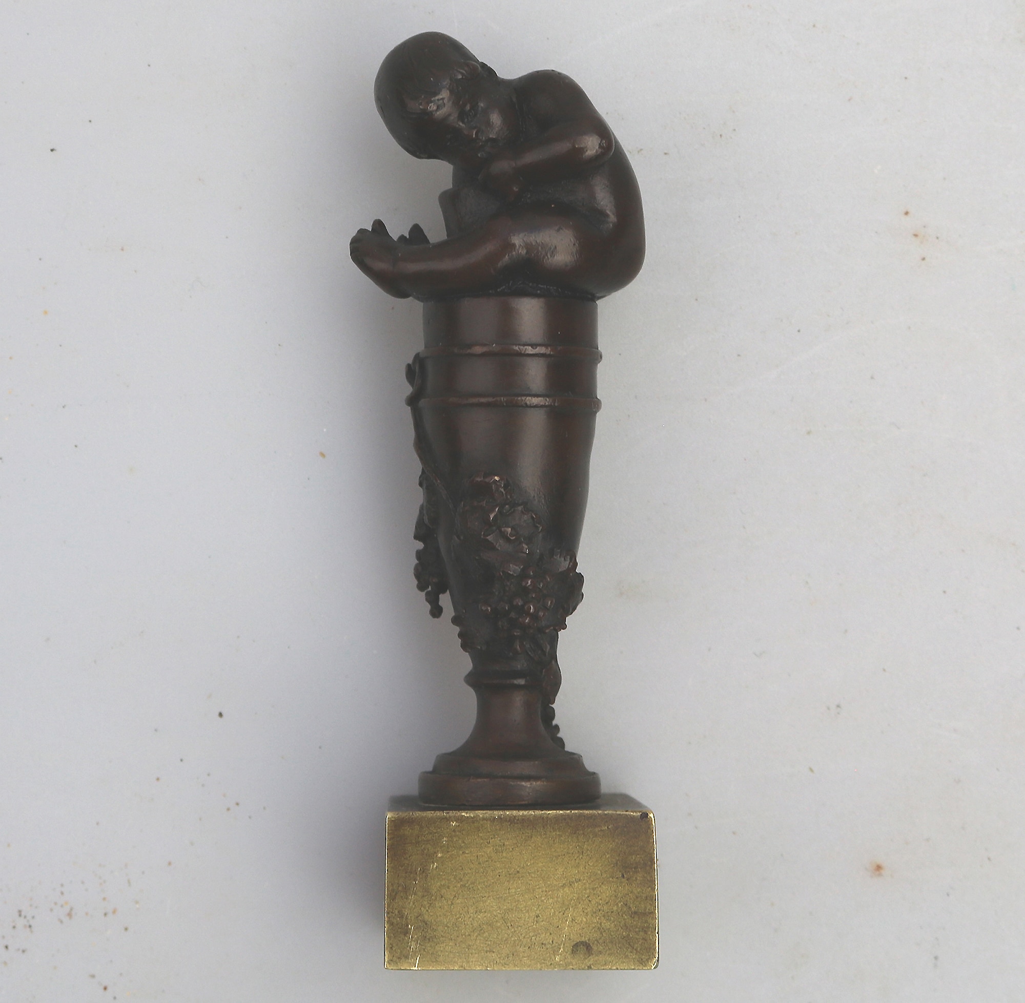 A good & rare antique novelty Grand Tour bronze figural child Desk Seal C.19thC