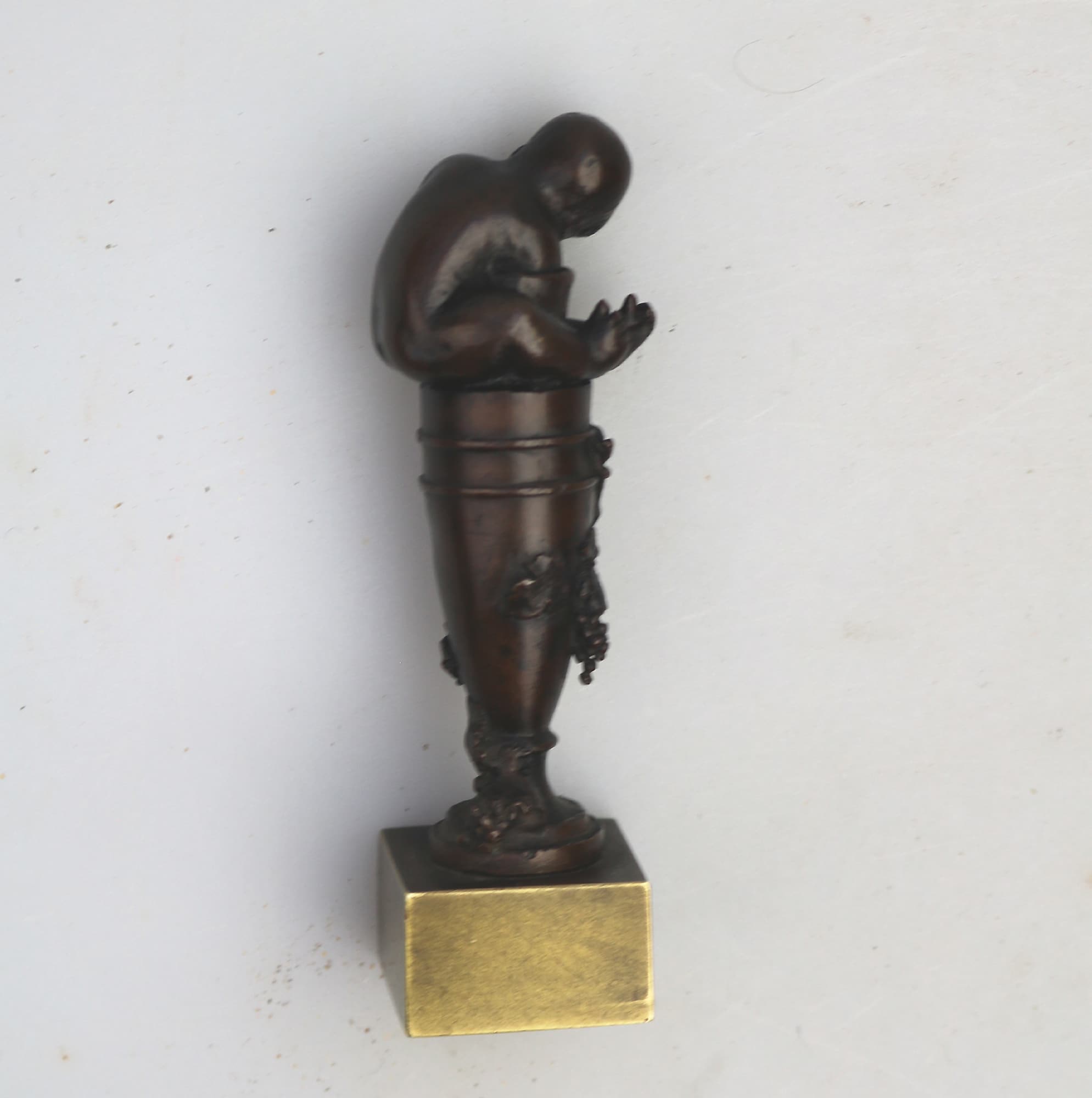A good & rare antique novelty Grand Tour bronze figural child Desk Seal C.19thC