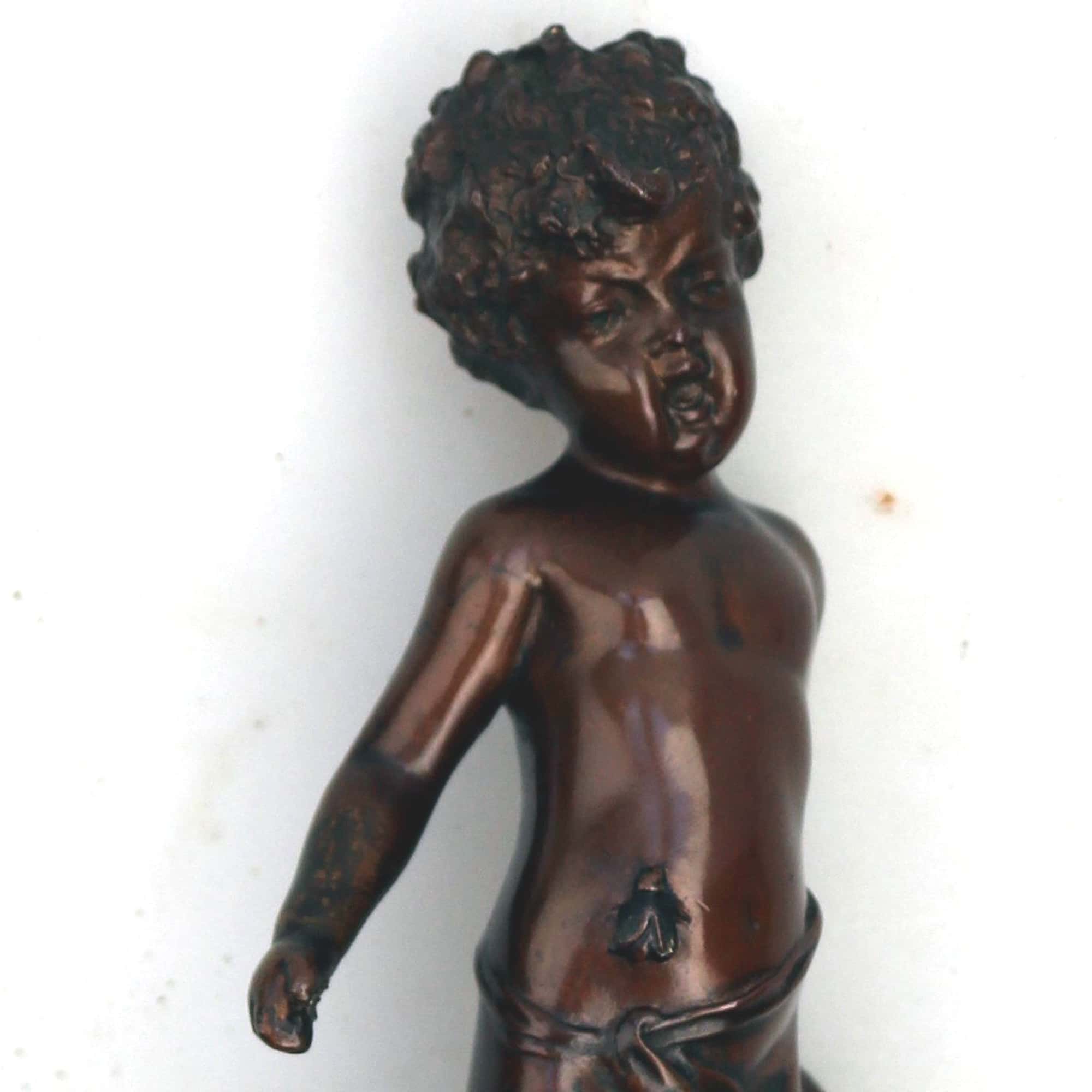 A fine and very charming antique bronze sculpture Figurine of child & Fly C.19thC