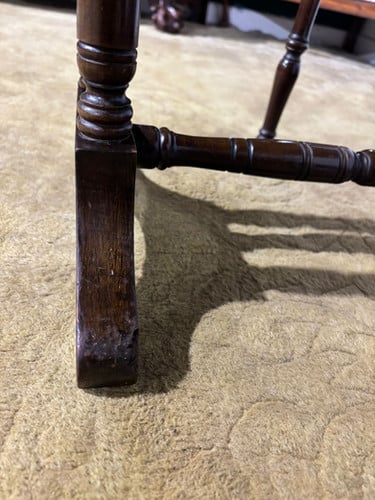 Edwardian mahogany table of small proportions resting on turned legs