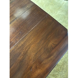 Edwardian mahogany table of small proportions resting on turned legs