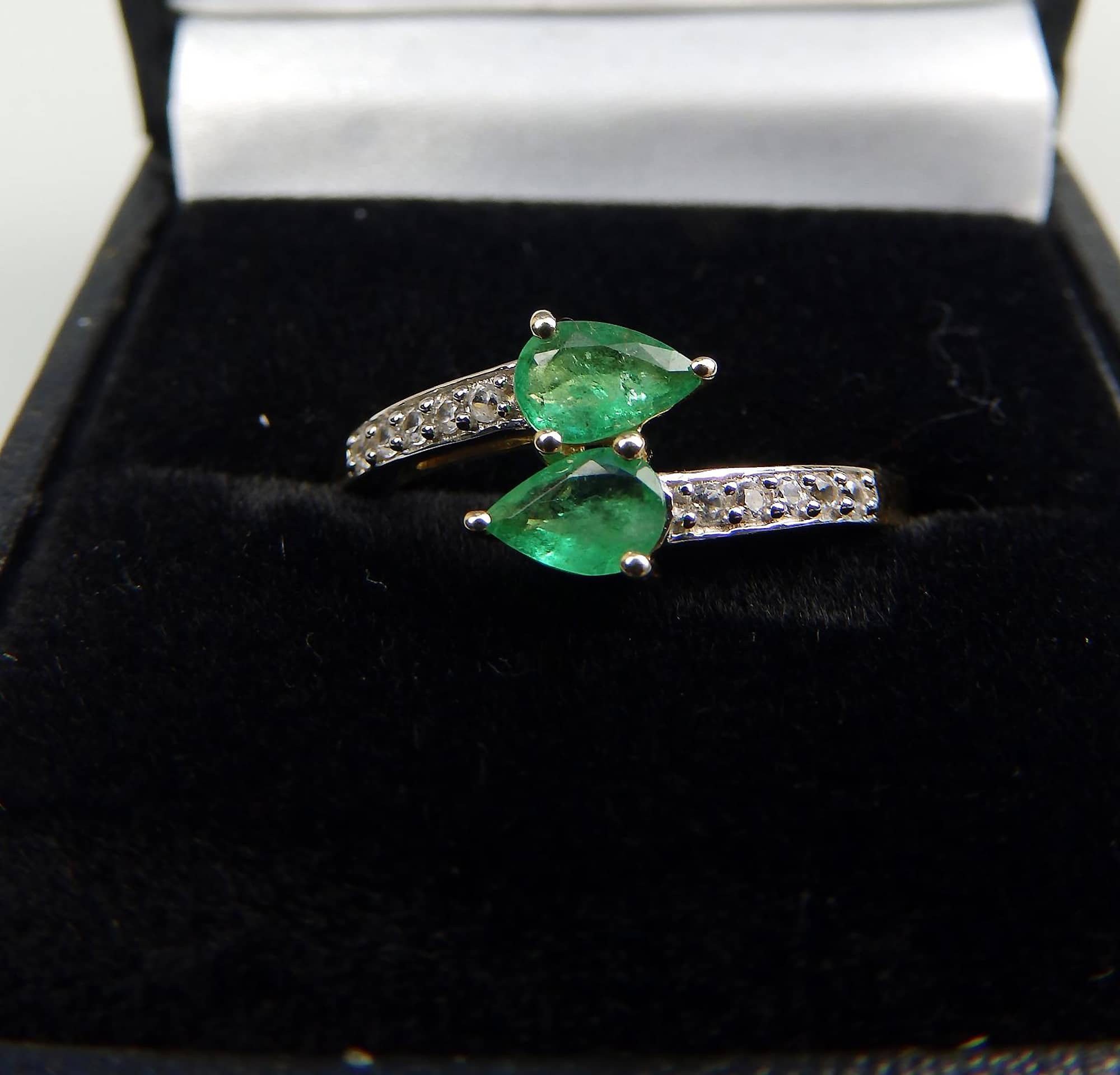 A Fine vintage 10ct gold, emerald & white topaz Crossover Ring Boxed 20thC
