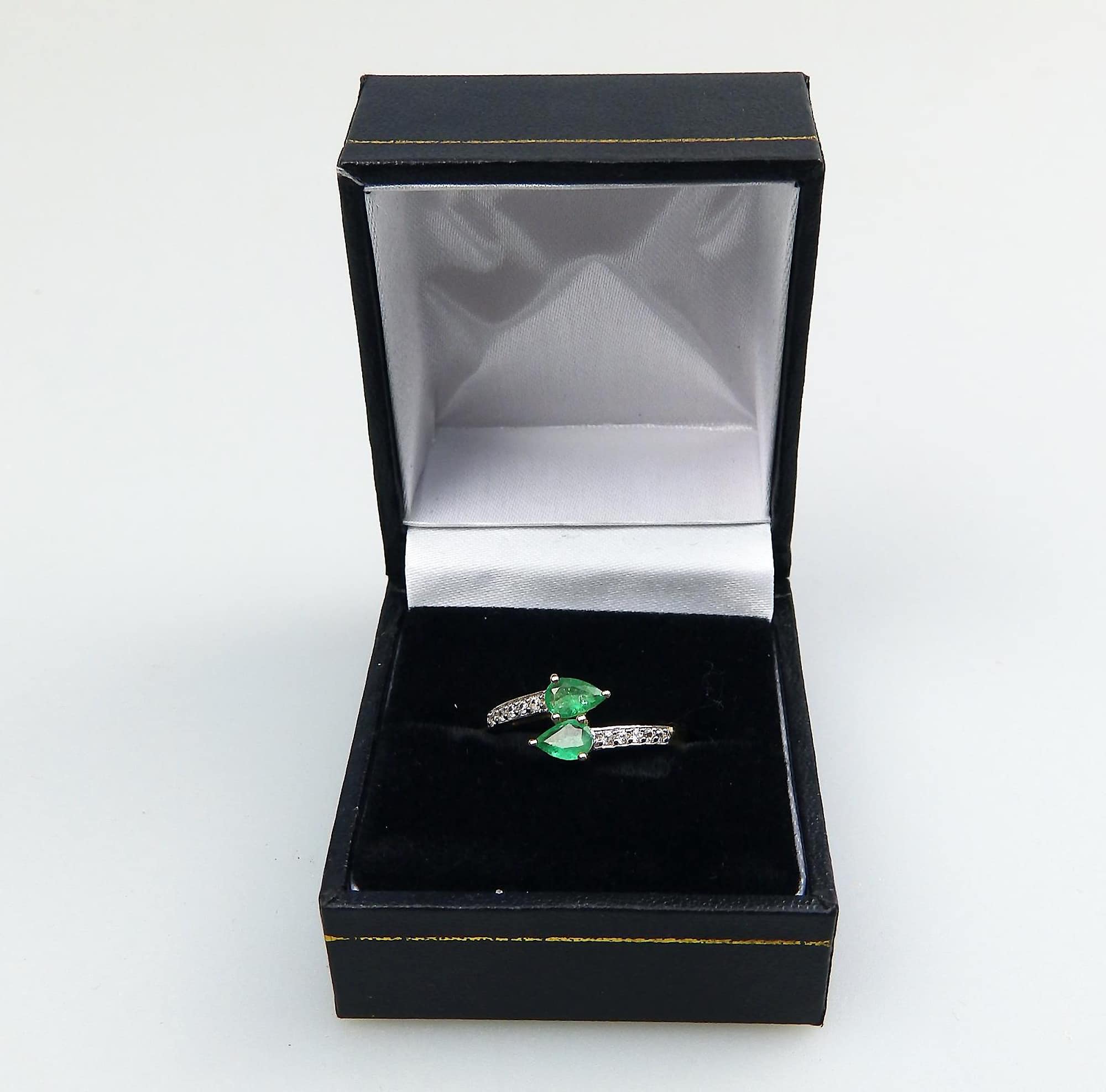 A Fine vintage 10ct gold, emerald & white topaz Crossover Ring Boxed 20thC