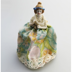 A good antique novelty porcelain half doll with dress - wire frame C.early 20thC