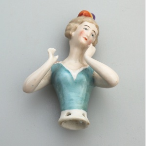 A good antique European hand-painted porcelain arms away half doll C.early 20thC
