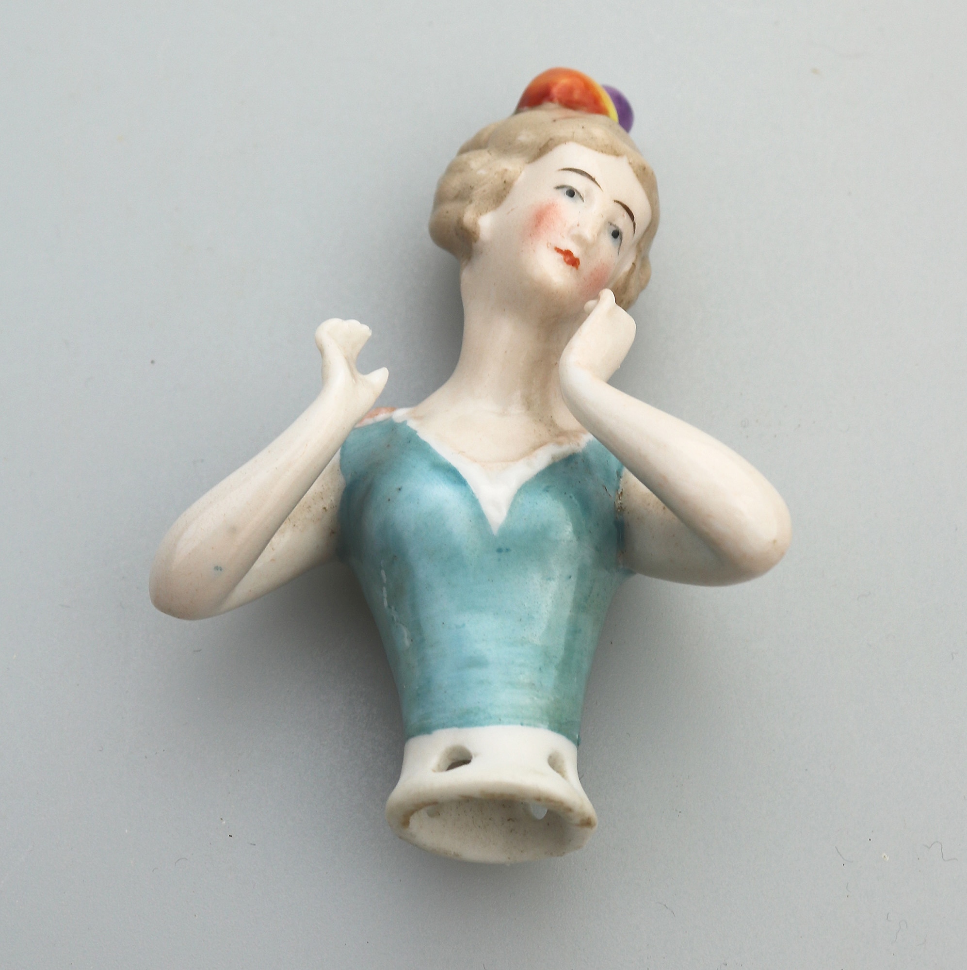 A good antique European hand-painted porcelain arms away half doll C.early 20thC
