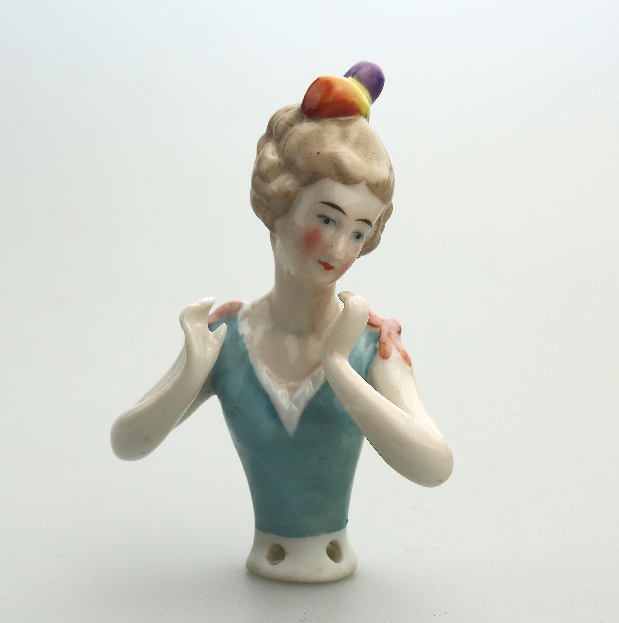 A good antique European hand-painted porcelain arms away half doll C.early 20thC