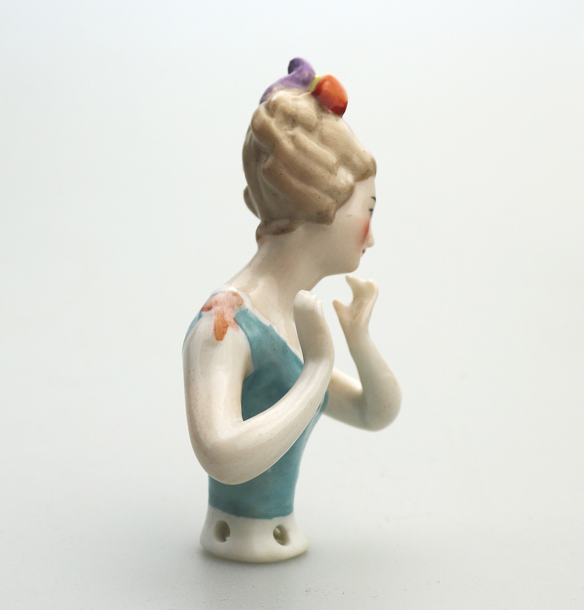 A good antique European hand-painted porcelain arms away half doll C.early 20thC
