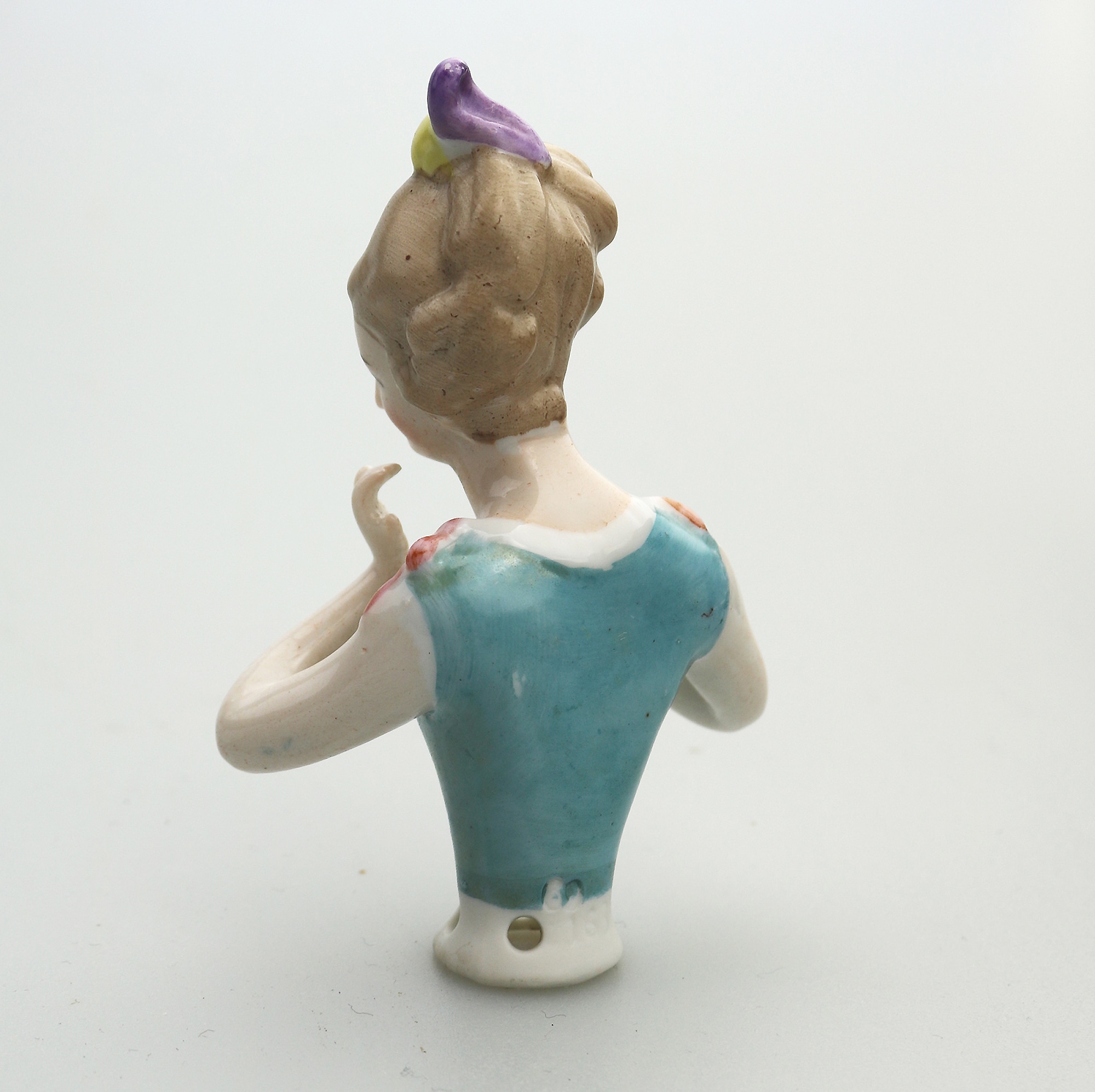 A good antique European hand-painted porcelain arms away half doll C.early 20thC
