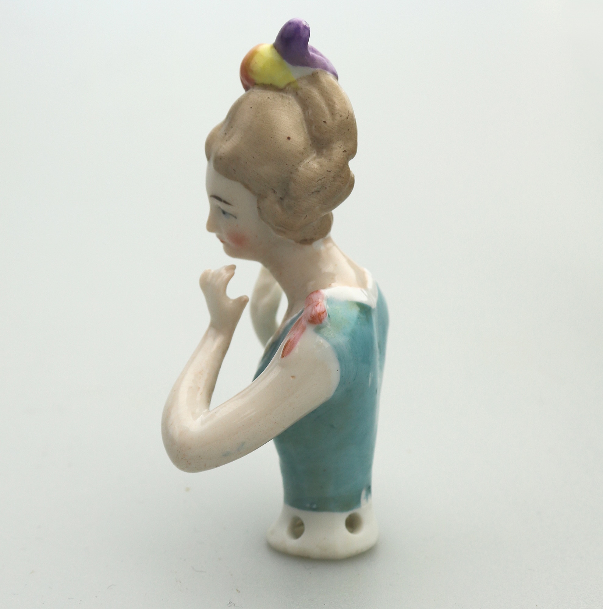 A good antique European hand-painted porcelain arms away half doll C.early 20thC