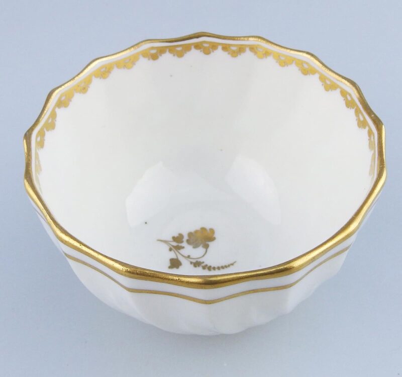 An antique Georgian Royal Crown Derby moulded porcelain gilt Tea Bowl C.1784+