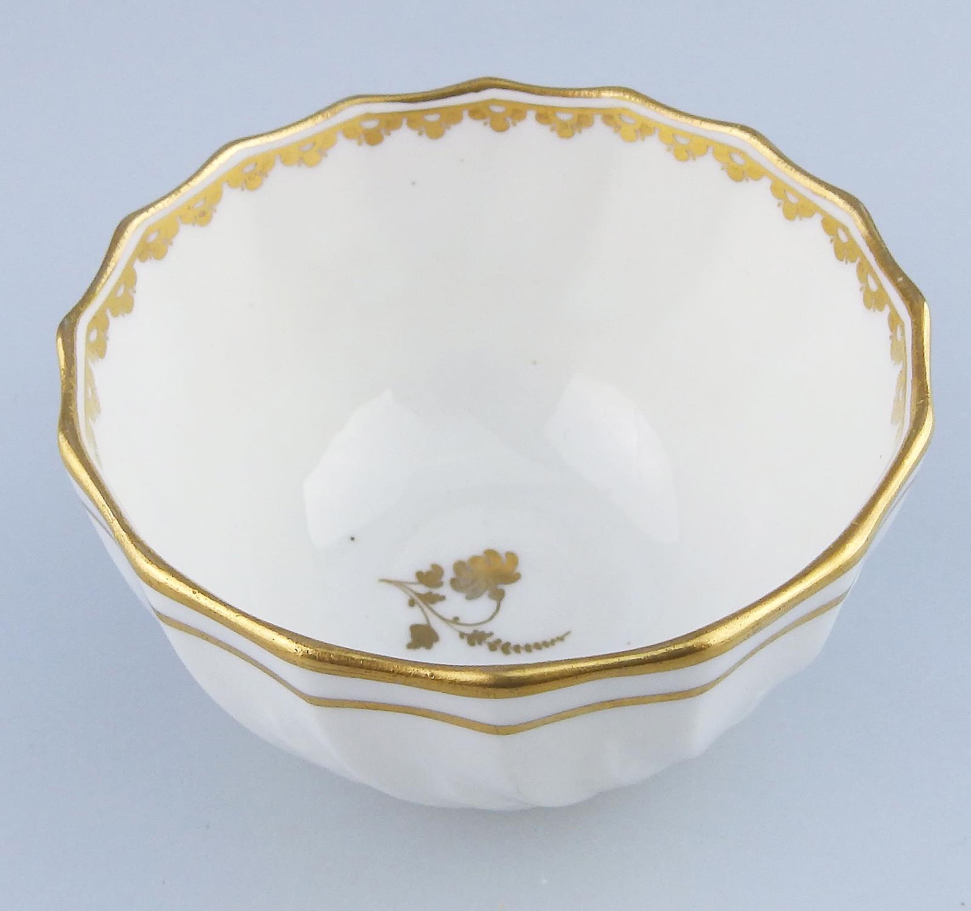 An antique Georgian Royal Crown Derby moulded porcelain gilt Tea Bowl C.1784+