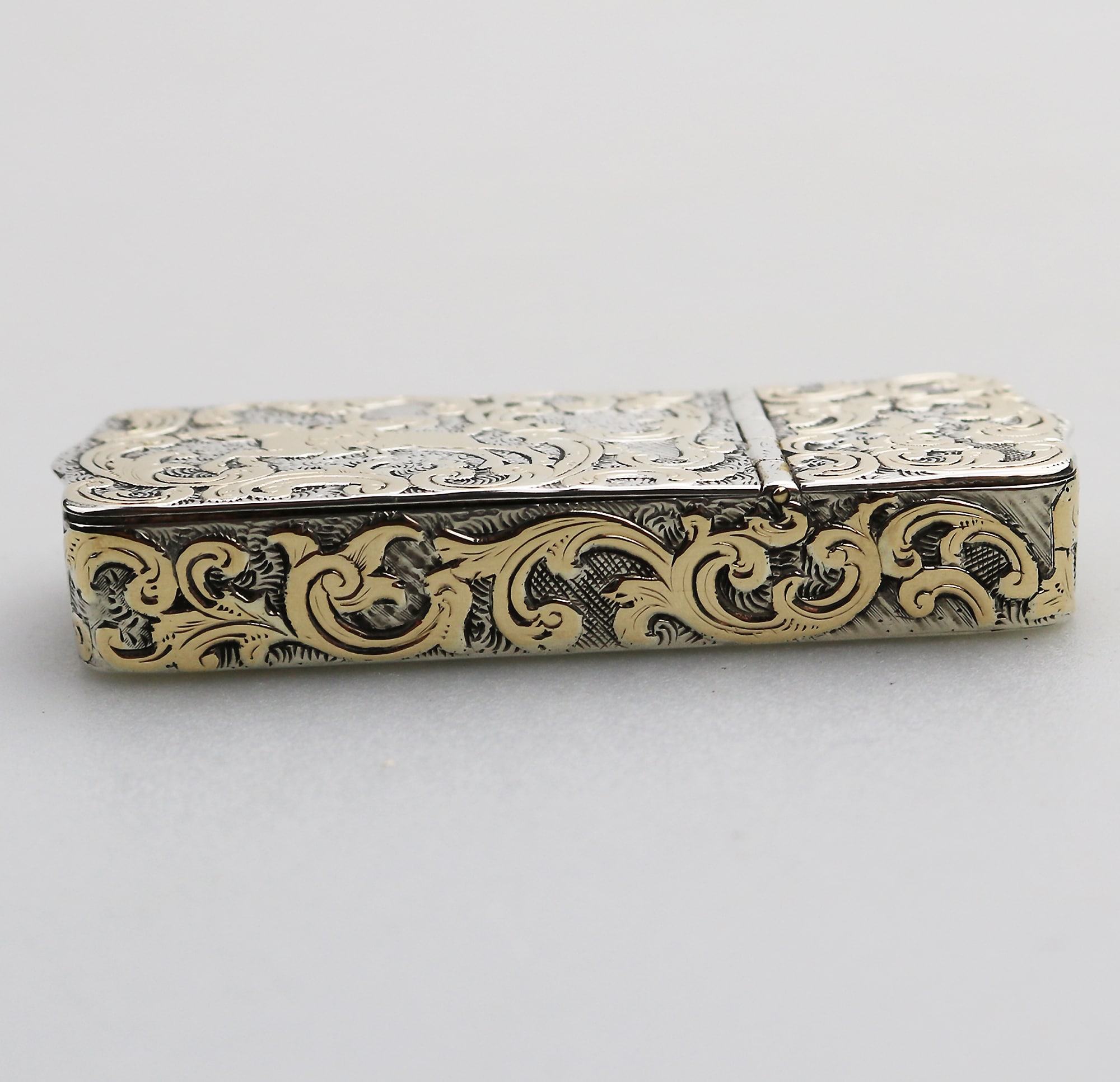 A fine antique double opening novelty solid silver parcel gilt Snuff Box C.19thC