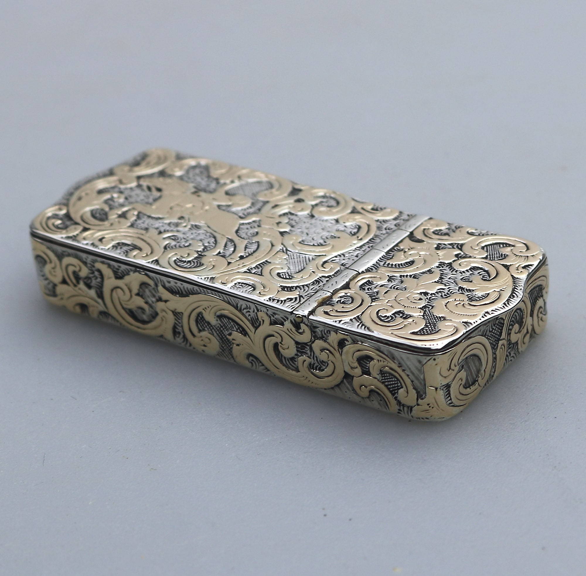 A fine antique double opening novelty solid silver parcel gilt Snuff Box C.19thC