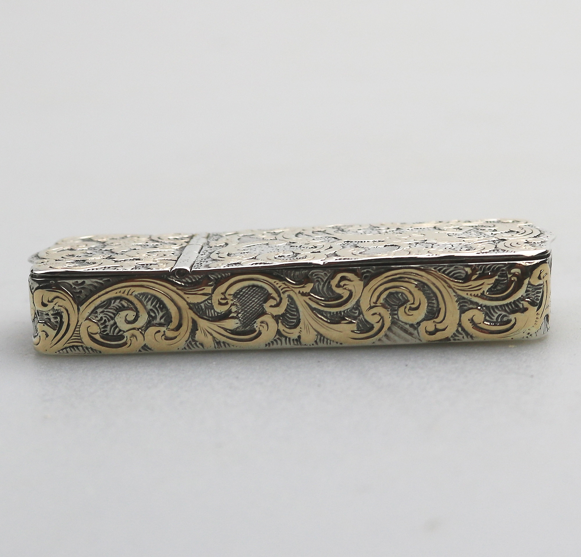 A fine antique double opening novelty solid silver parcel gilt Snuff Box C.19thC