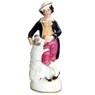 An antique Staffordshire pottery hand-painted Shepherd Figurine C.Mid 19thC