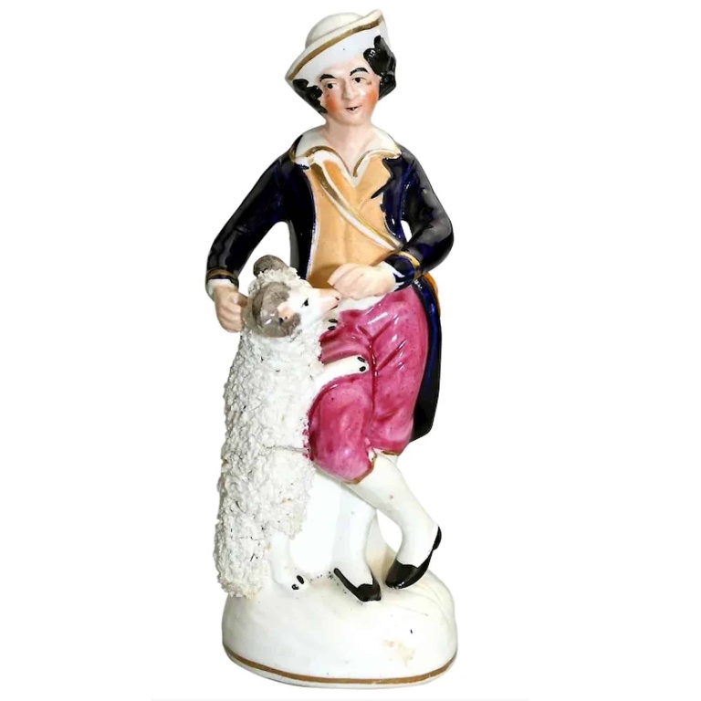 An antique Staffordshire pottery hand-painted Shepherd Figurine C.Mid 19thC