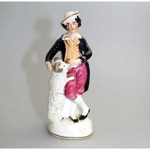 An antique Staffordshire pottery hand-painted Shepherd Figurine C.Mid 19thC