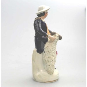 An antique Staffordshire pottery hand-painted Shepherd Figurine C.Mid 19thC