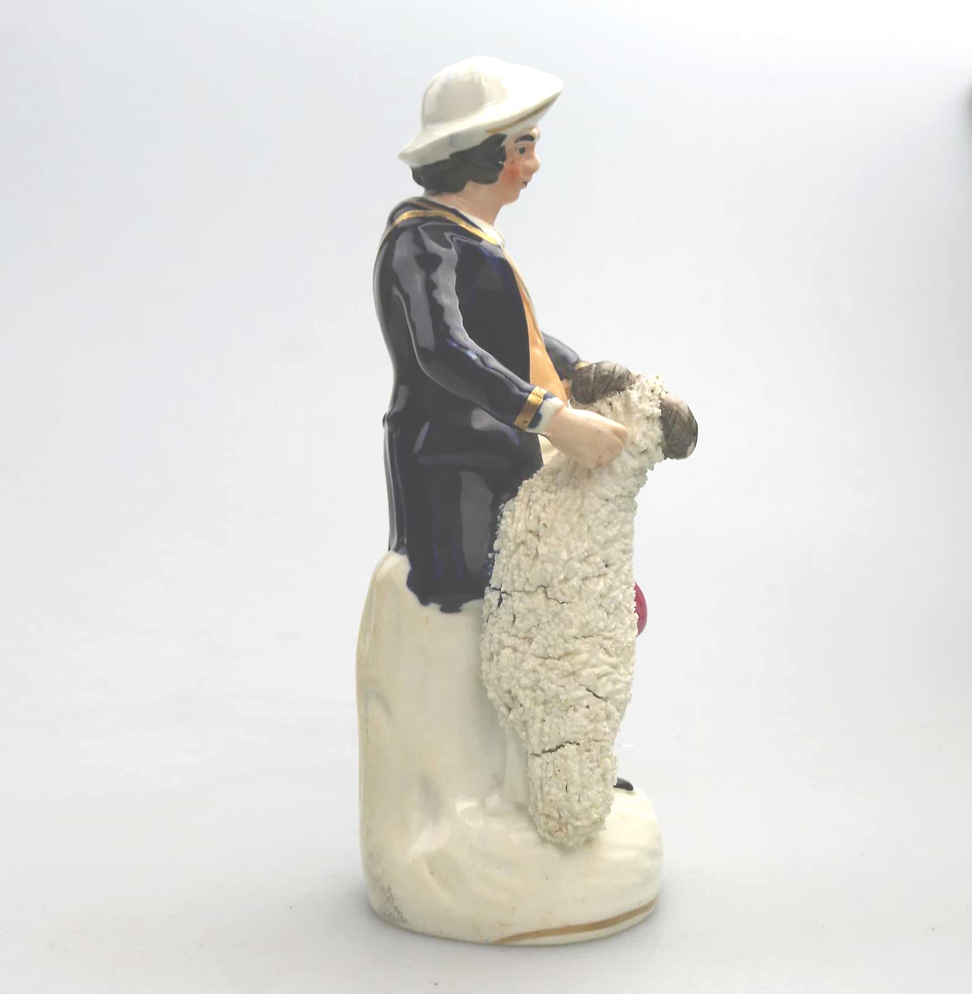 An antique Staffordshire pottery hand-painted Shepherd Figurine C.Mid 19thC