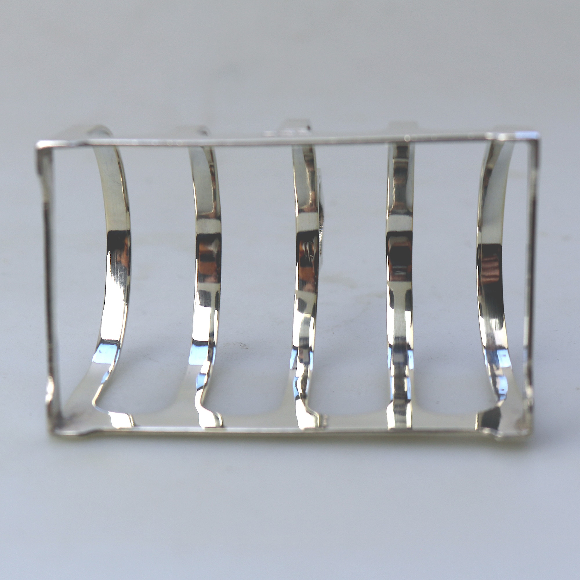An antique English solid silver 4 division Toast Rack by Edward Viner 55g C.1939