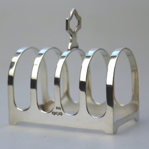 An antique English solid silver 4 division Toast Rack by Edward Viner 55g C.1939
