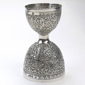 An unusual antique novelty English solid silver double Wager Cup Measure C.1898