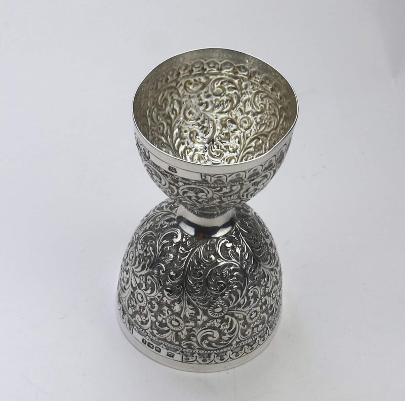 An unusual antique novelty English solid silver double Wager Cup Measure C.1898
