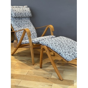 Mid century style Scandinavian lounge chair and footstool by Simo Heikkila