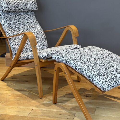 Mid century style Scandinavian lounge chair and footstool by Simo Heikkila