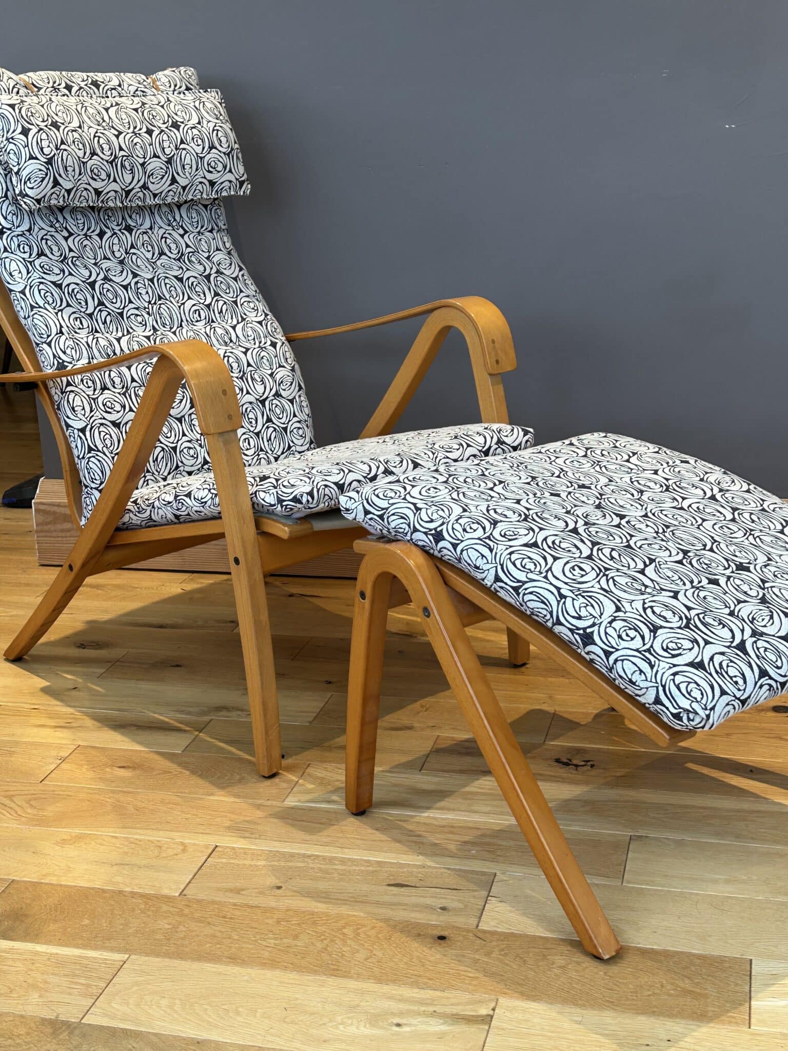 Mid century style Scandinavian lounge chair and footstool by Simo Heikkila