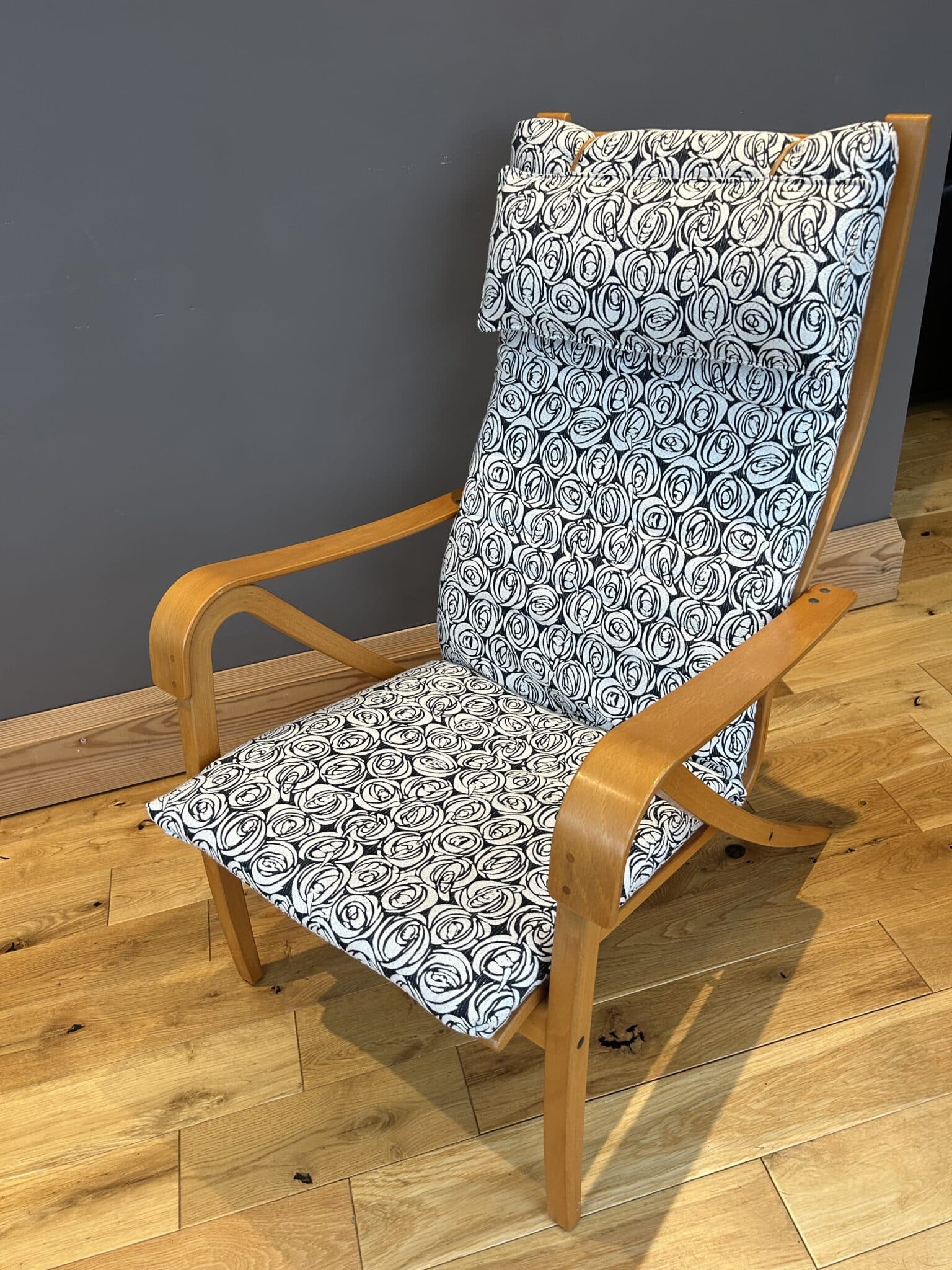 Mid century style Scandinavian lounge chair and footstool by Simo Heikkila