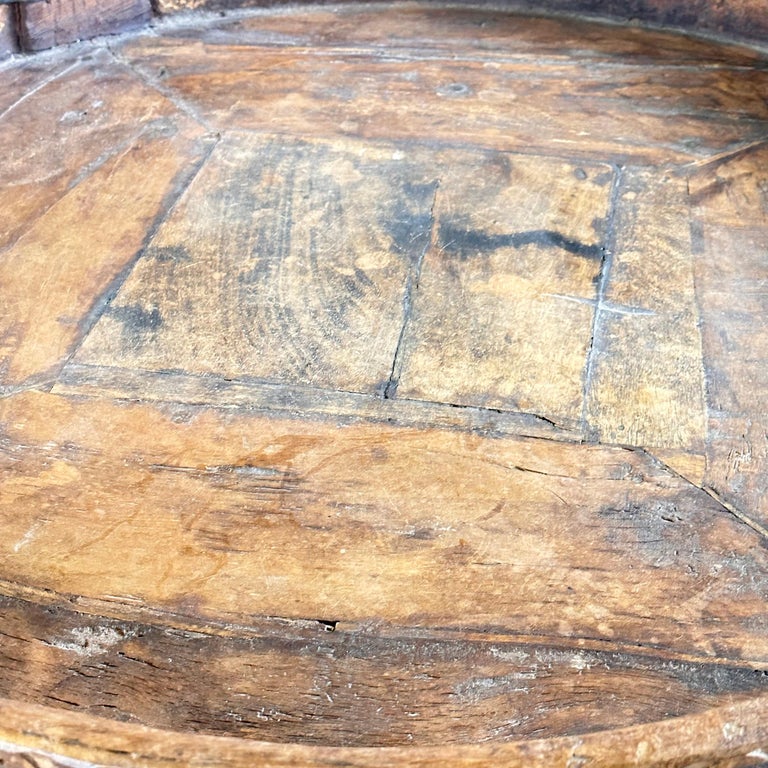 Early 1900s Indian Carved Wooden Chakki Grinder Coffee Table with Iron Detailing