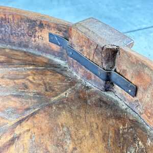 Early 1900s Indian Carved Wooden Chakki Grinder Coffee Table with Iron Detailing