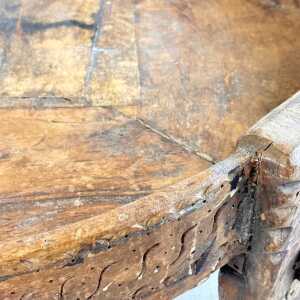 Early 1900s Indian Carved Wooden Chakki Grinder Coffee Table with Iron Detailing