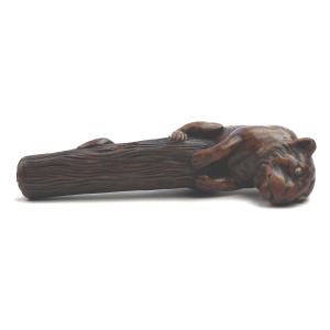 A good carved boxwood novelty Parasol Handle of a tiger glass eyes C.1900