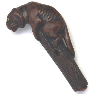 A good carved boxwood novelty Parasol Handle of a tiger glass eyes C.1900