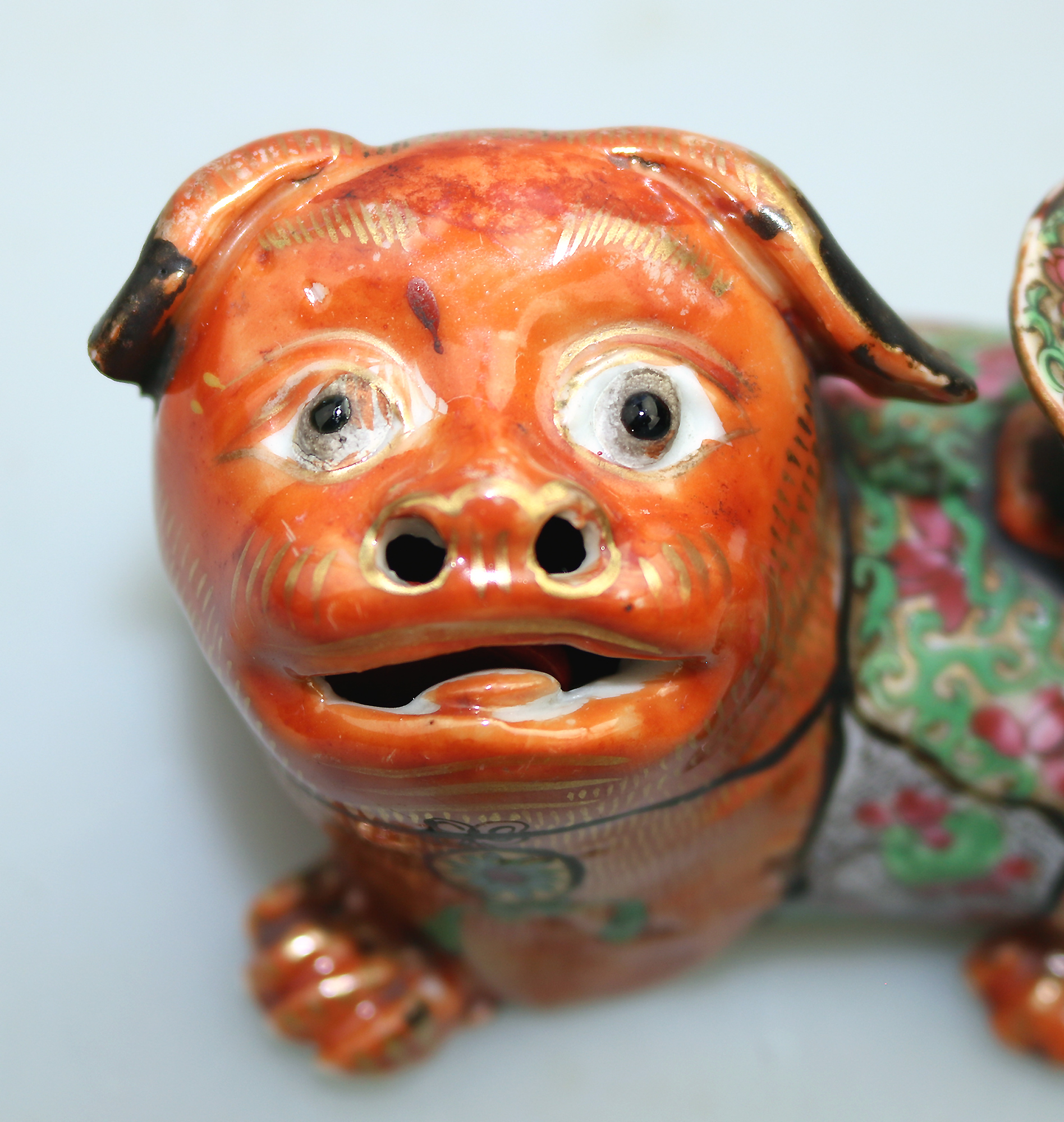 Antique Qing Chinese Canton famille rose porcelain Buddhist lion Candlestick
