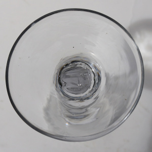 A very unusual antique Georgian stemware glass with engraved tulip border C.18thC
