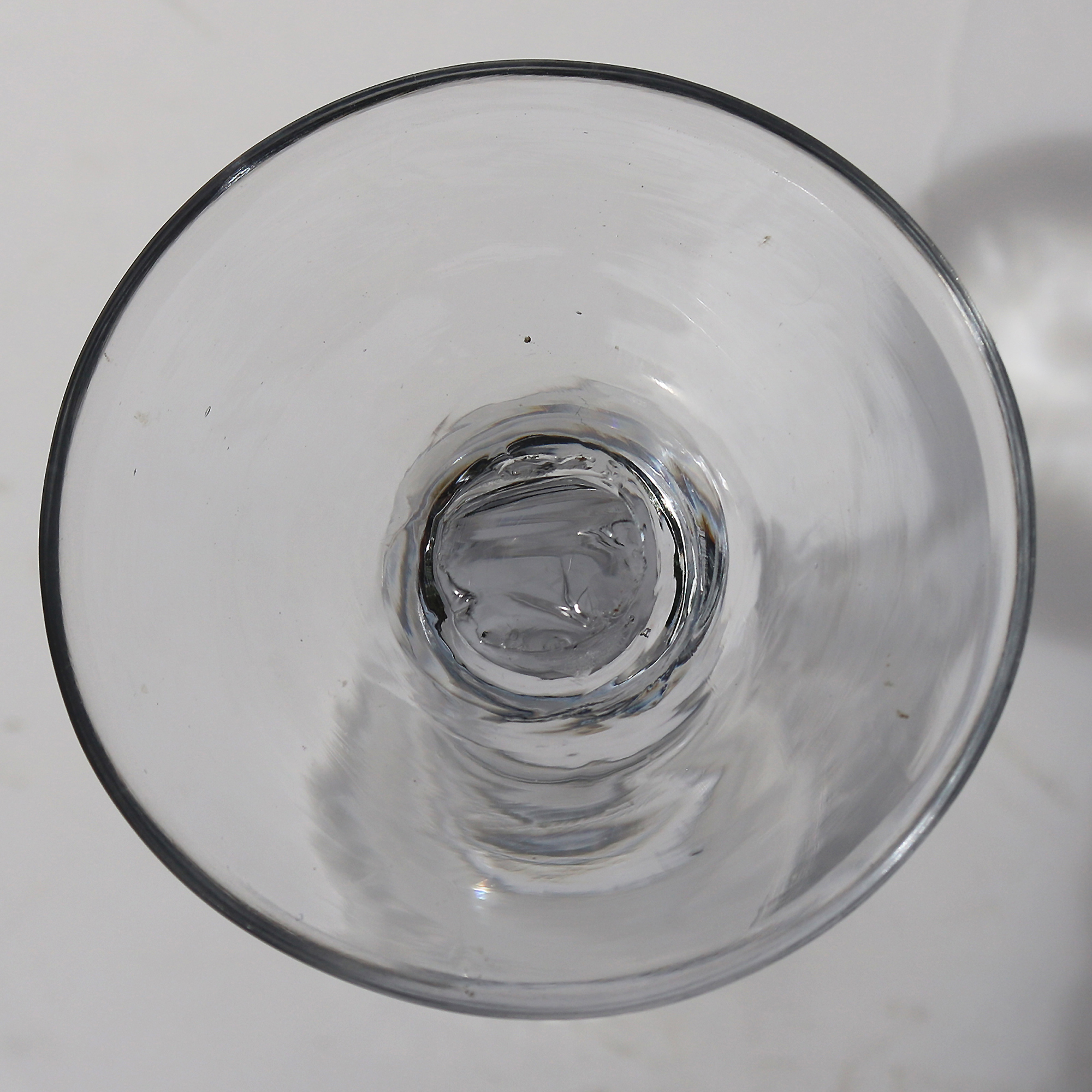 A very unusual antique Georgian stemware glass with engraved tulip border C.18thC