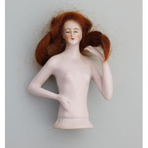 A superb Art Deco German porcelain bathing beauty half doll with hair C.1920's