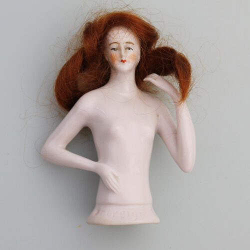 A superb Art Deco German porcelain bathing beauty half doll with hair C.1920's