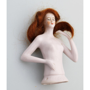 A superb Art Deco German porcelain bathing beauty half doll with hair C.1920's