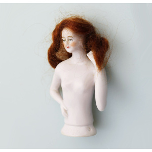 A superb Art Deco German porcelain bathing beauty half doll with hair C.1920's