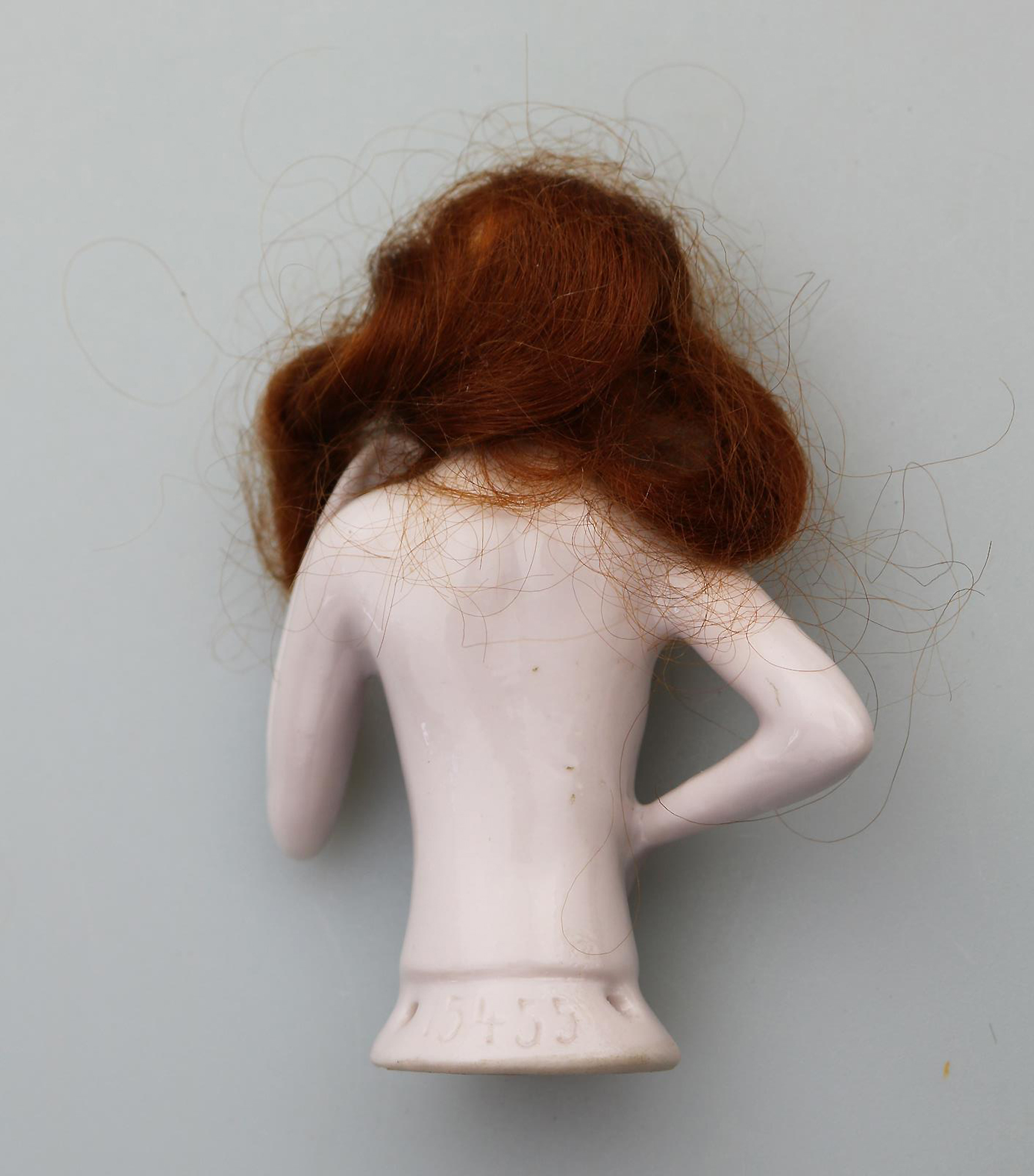 A superb Art Deco German porcelain bathing beauty half doll with hair C.1920's