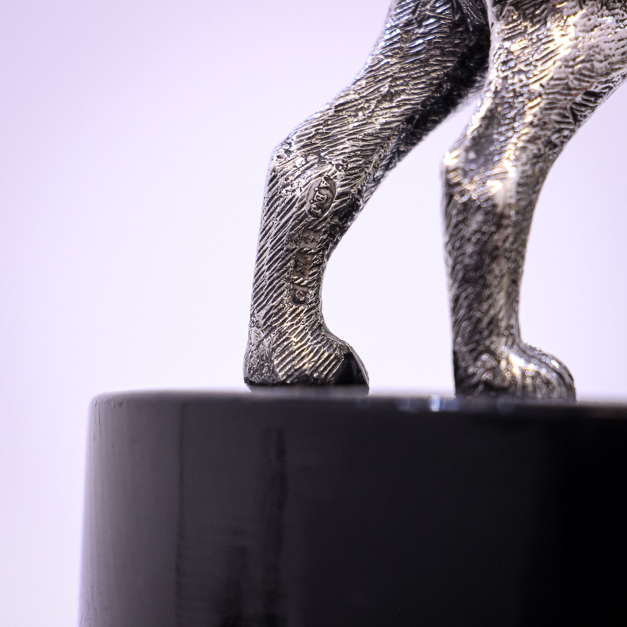 Silver Sculpture of a Dog by A.E. Jones