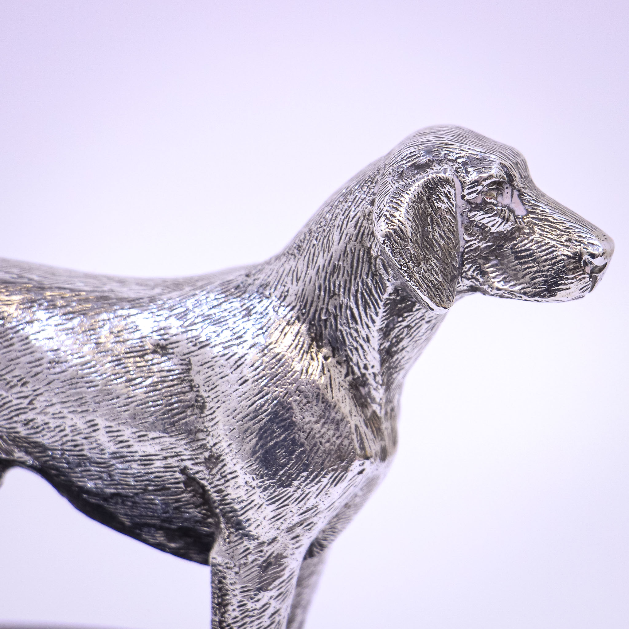 Silver Sculpture of a Dog by A.E. Jones