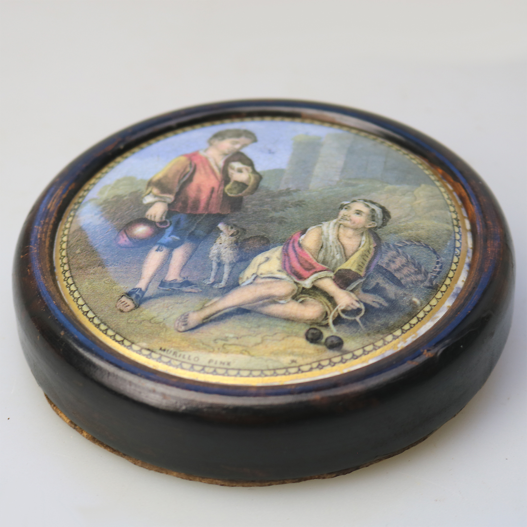 An antique framed English Prattware pottery Pot Lid Peasant Boys C.19thC